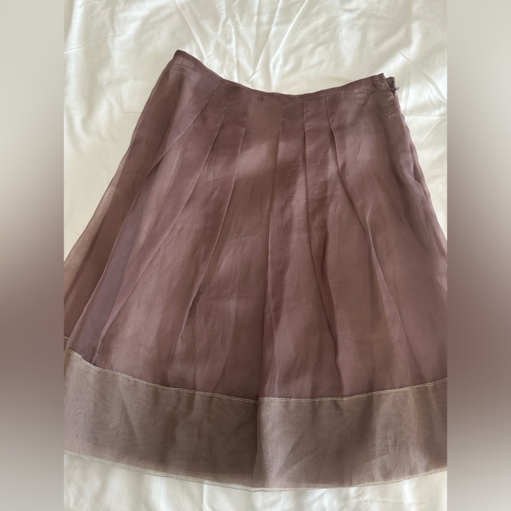 BCBGMAXAZRIA lined sheer skirt.